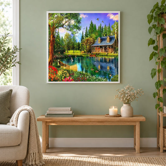Haus am See als gerahmtes Diamond Painting im Wohnzimmer